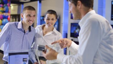 people in consumer electronics retail store