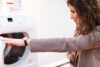 woman shopping for wash machine