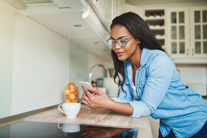 woman interacting with intelligent virutal assistant app