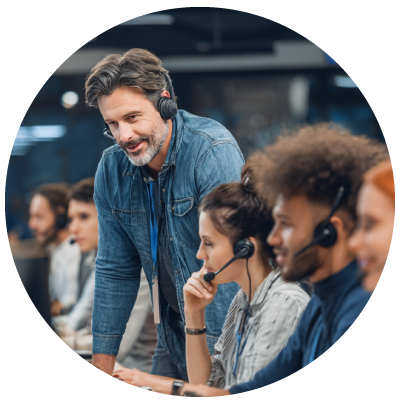 call center agents working on computers with headsets 