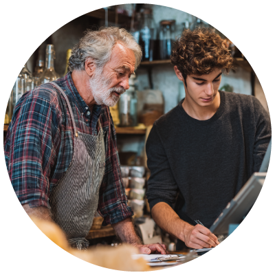 older man training new employee